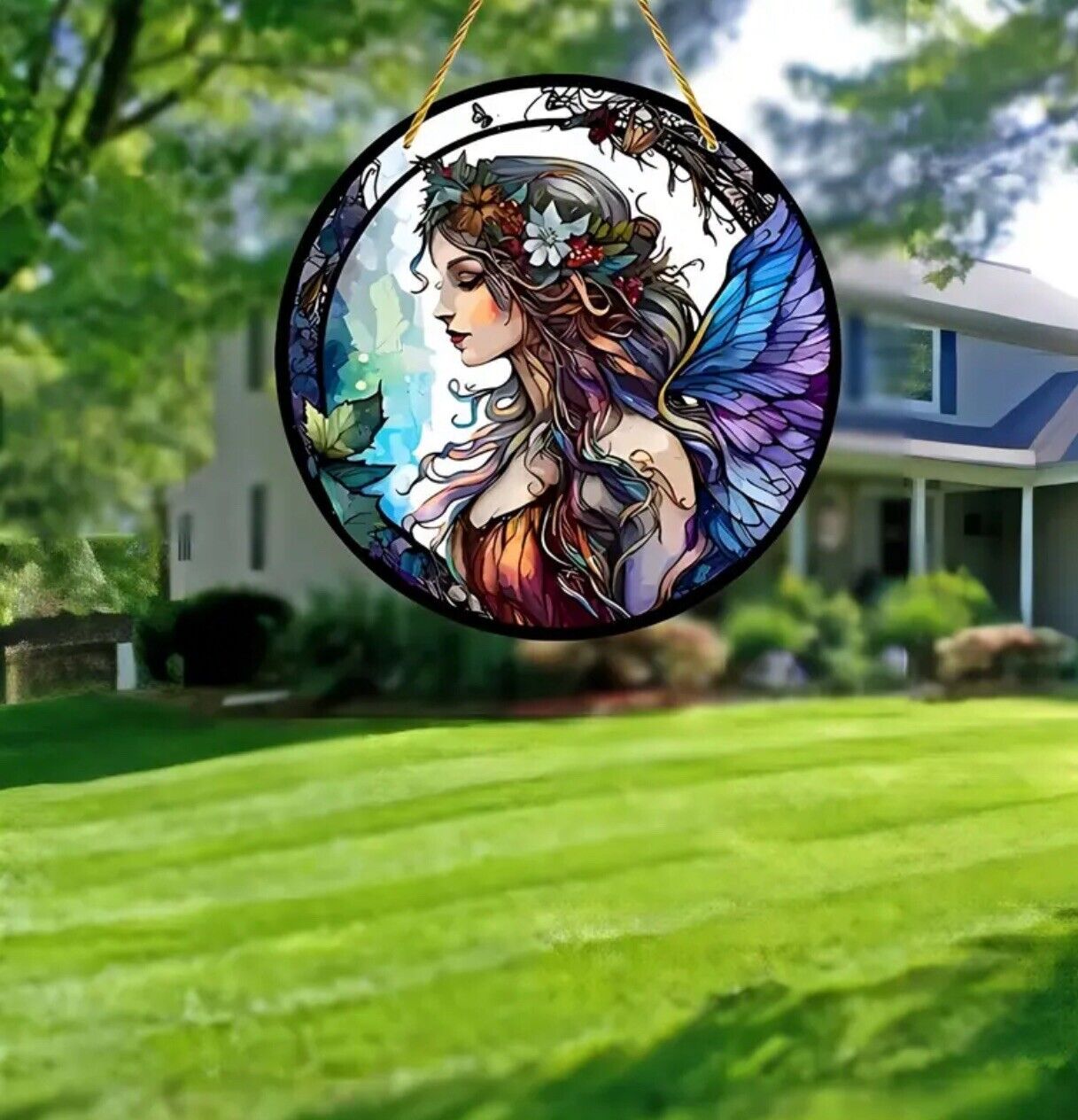 Fairy lady stained glass acrylic suncatcher with enchanting blue wings design.