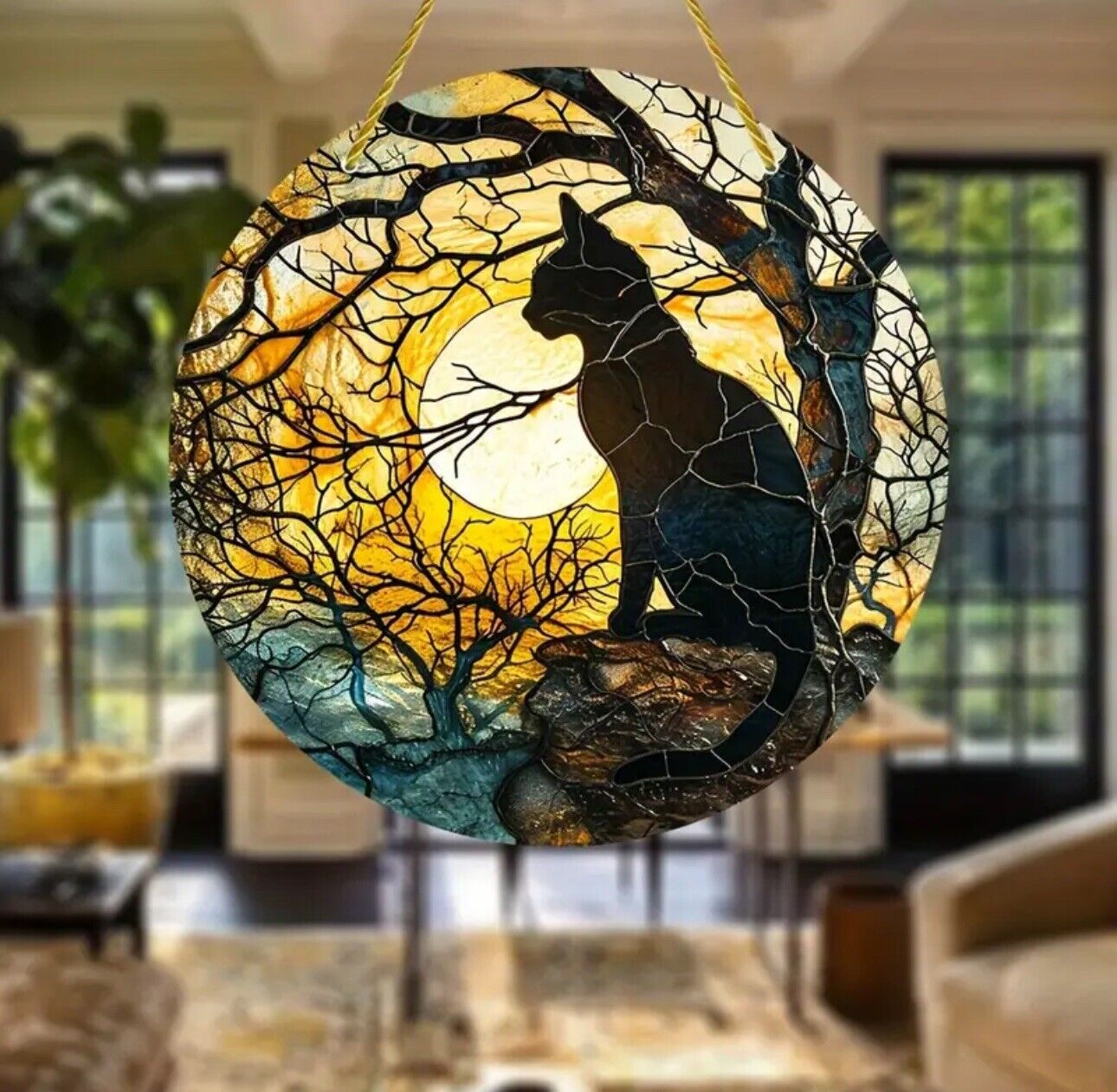 Black cat with moon and trees suncatcher, perfect for Halloween décor.