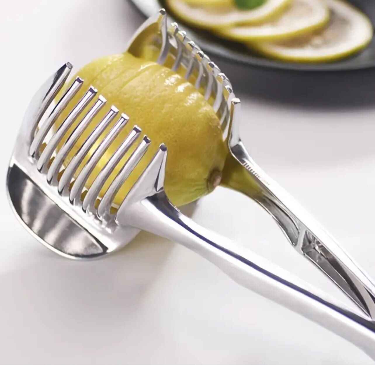 Effortlessly slice tomatoes, lemons, and onions with our stainless steel slicer