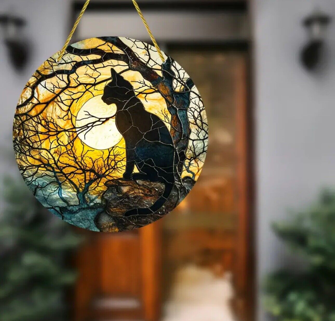 Black cat with moon and trees suncatcher, perfect for Halloween décor.