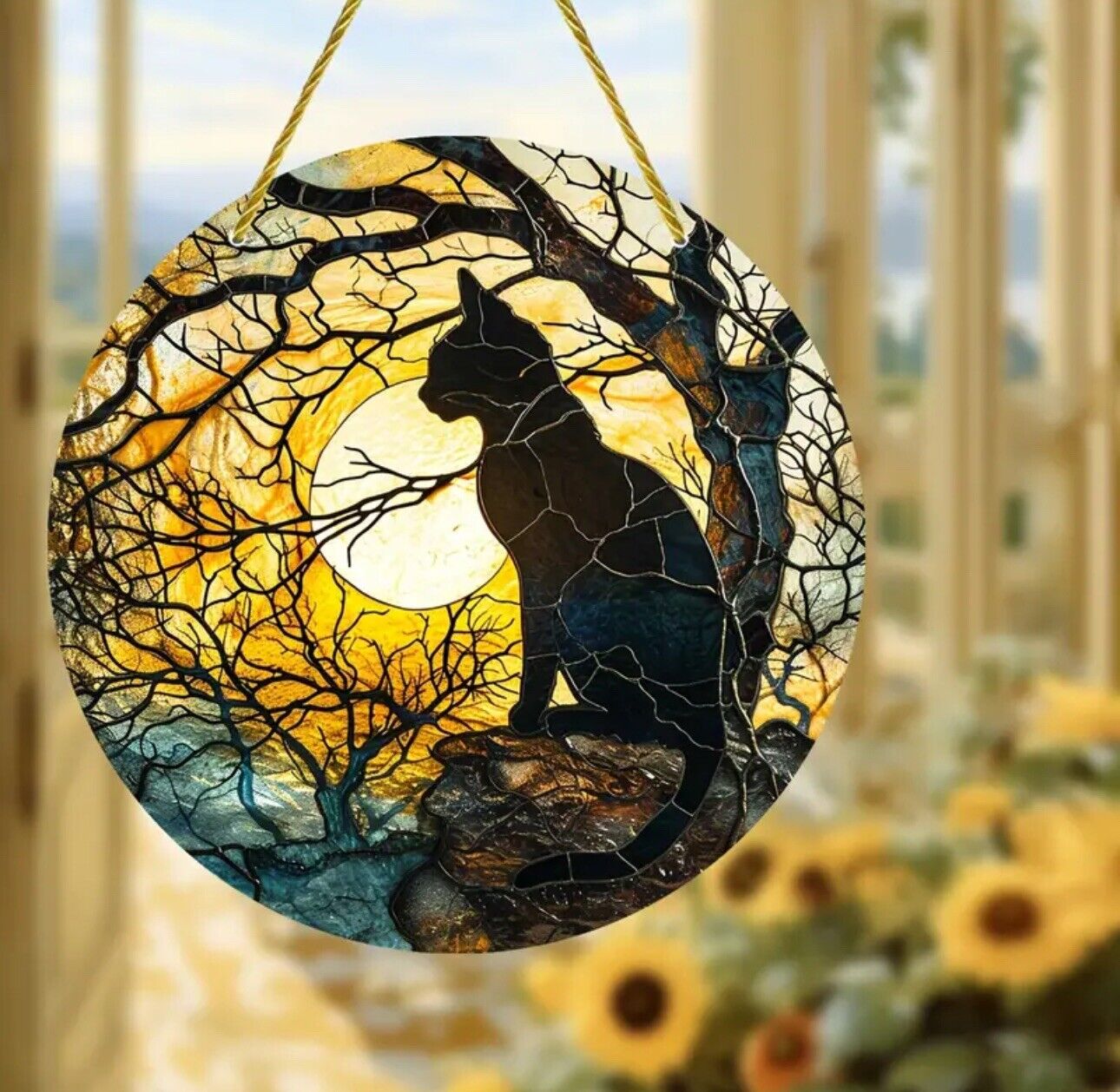 Black cat with moon and trees suncatcher, perfect for Halloween décor.