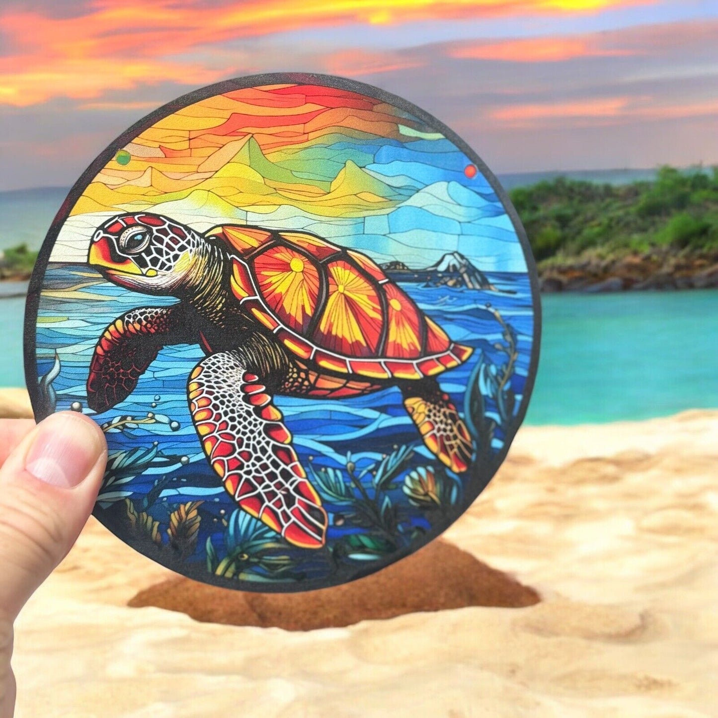 Sea turtle suncatcher with sunset design, perfect for coastal décor.