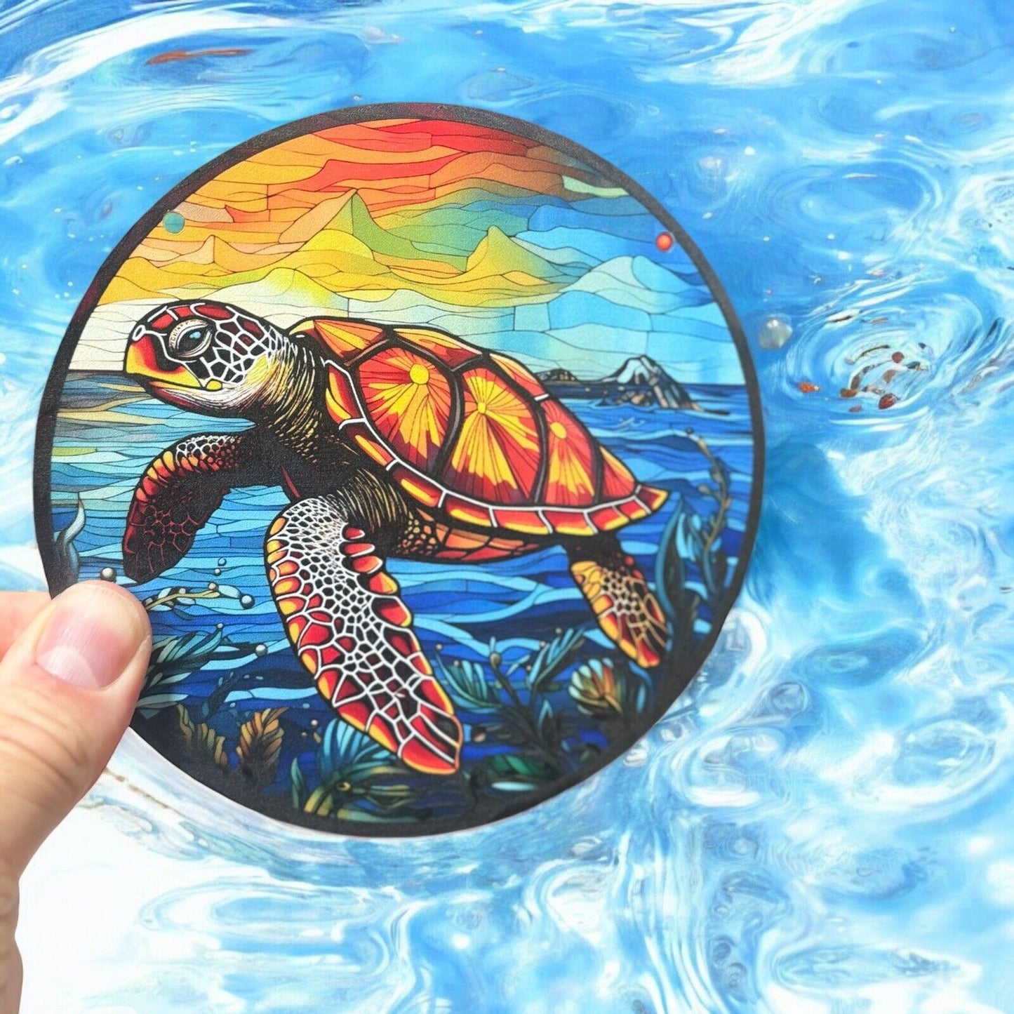 Sea turtle suncatcher with sunset design, perfect for coastal décor.