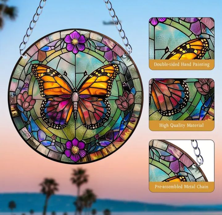 Stained glass acrylic butterfly suncatcher with purple flowers.