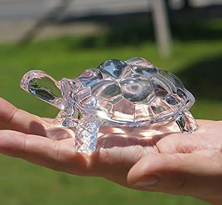 Glass tortoise for good luck and healing, a symbol of strength and prosperity.