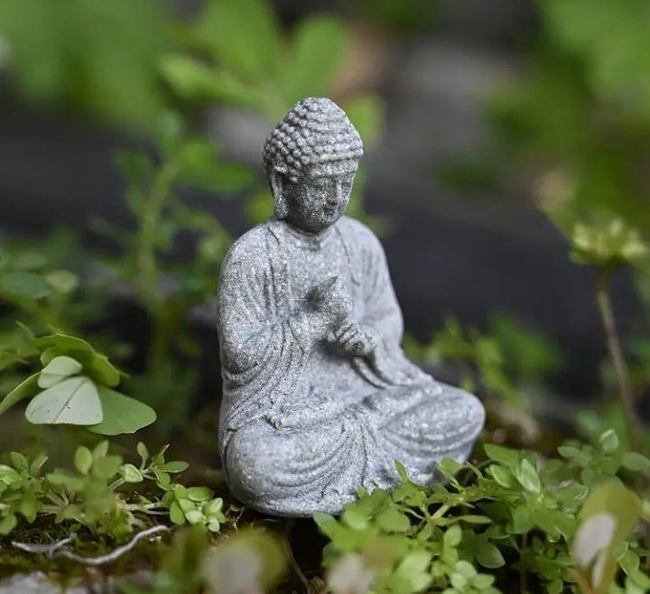 Mini Buddha statue, perfect for peaceful décor or spiritual inspiration.