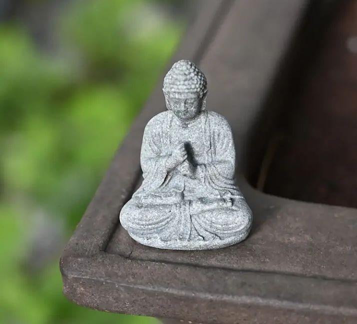 Mini Buddha statue, perfect for peaceful décor or spiritual inspiration.