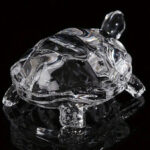 Glass tortoise for good luck and healing, a symbol of strength and prosperity.