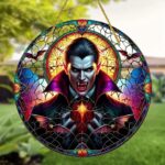 Stained glass acrylic suncatcher featuring Dracula, a Halloween moon design.