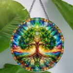 Stained glass acrylic Tree of Life suncatcher, vibrant and decorative.