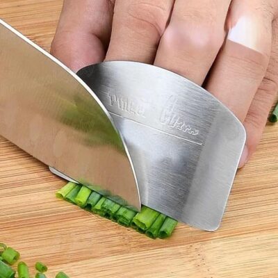 Metal Finger Guard: Safely slice veggies with this reusable kitchen essential.